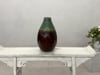 Green and Brown Glazed Ceramic Vase with Drip Effect and Rounded Silhouette