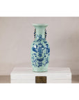 Cobalt blue and white porcelain vase with scholar images on a white chest, plain background, 19th century.