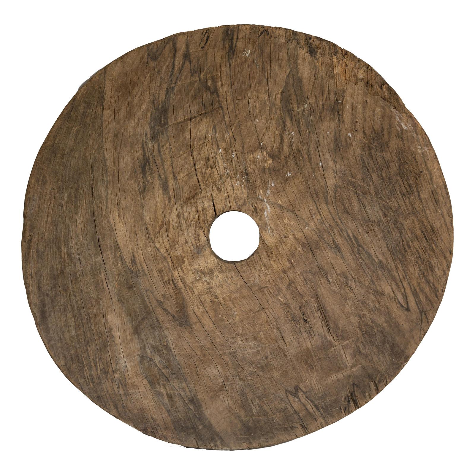 Large Ancient Cart Wheel with Rustic Character and Time-Worn Appearance