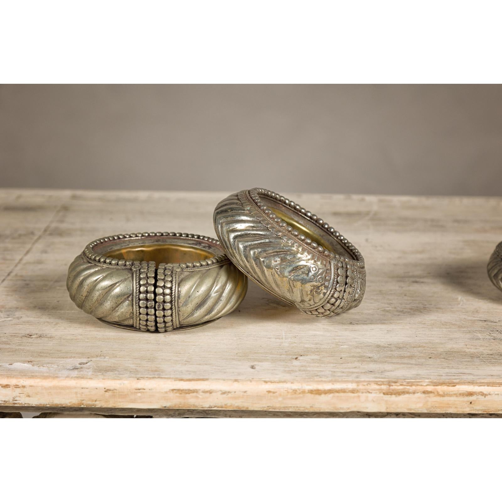 Assortment of Five Small Indian Repoussé Brass Decorative Dish Bowls