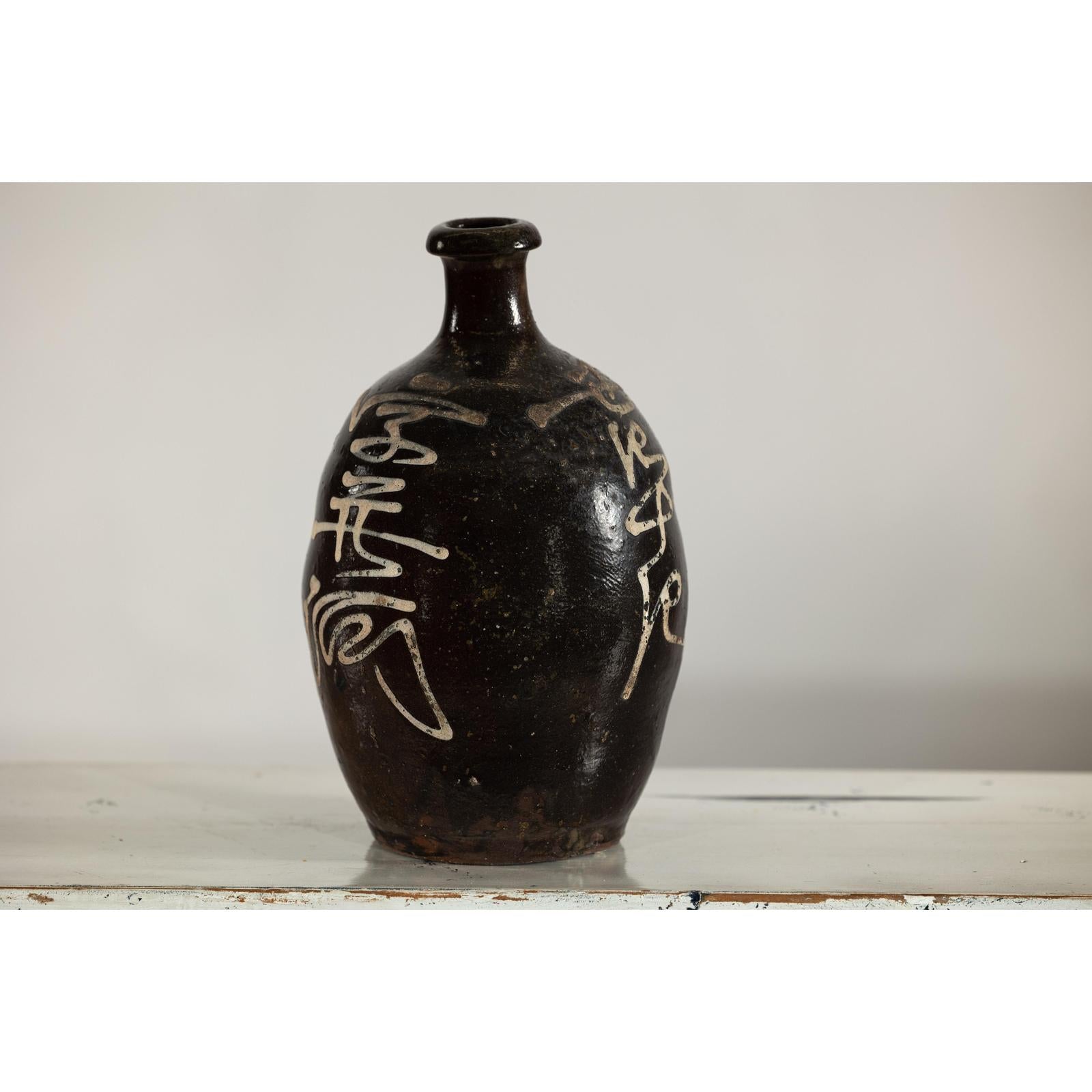 Late Qing Dynasty Ceramic Wine Jug with Calligraphy and Dark Glaze