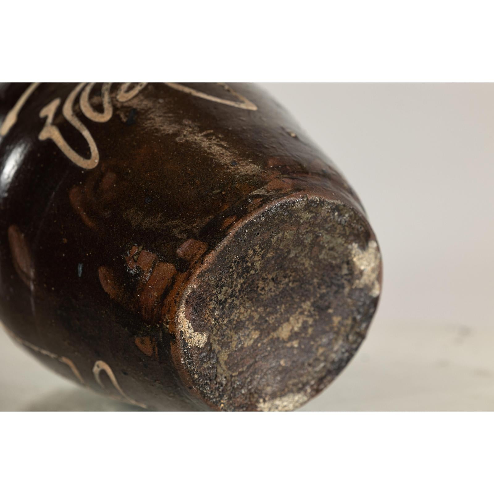 Late Qing Dynasty Ceramic Wine Jug with Calligraphy and Dark Glaze