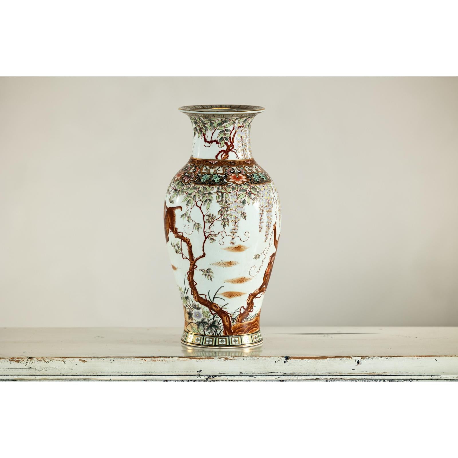 Porcelain Baluster Shaped Vase with Hand-Painted Monkeys and Floral Motifs
