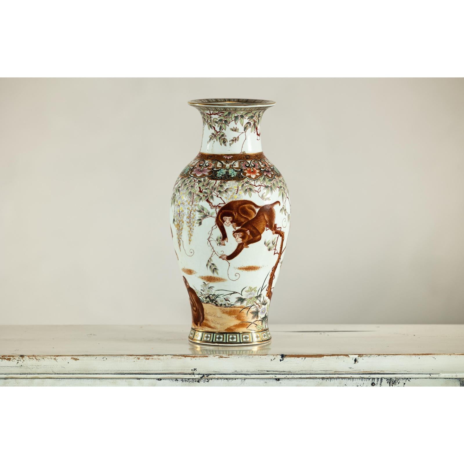 Porcelain Baluster Shaped Vase with Hand-Painted Monkeys and Floral Motifs