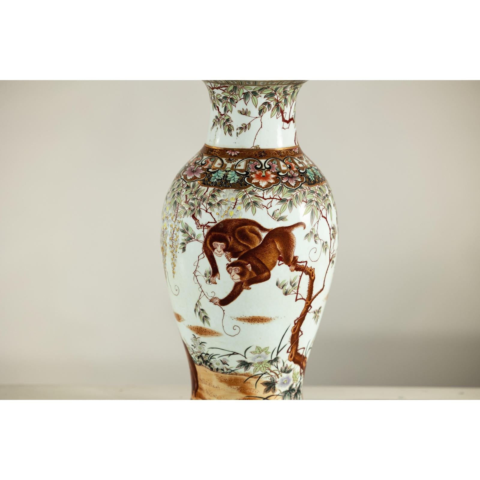 Porcelain Baluster Shaped Vase with Hand-Painted Monkeys and Floral Motifs