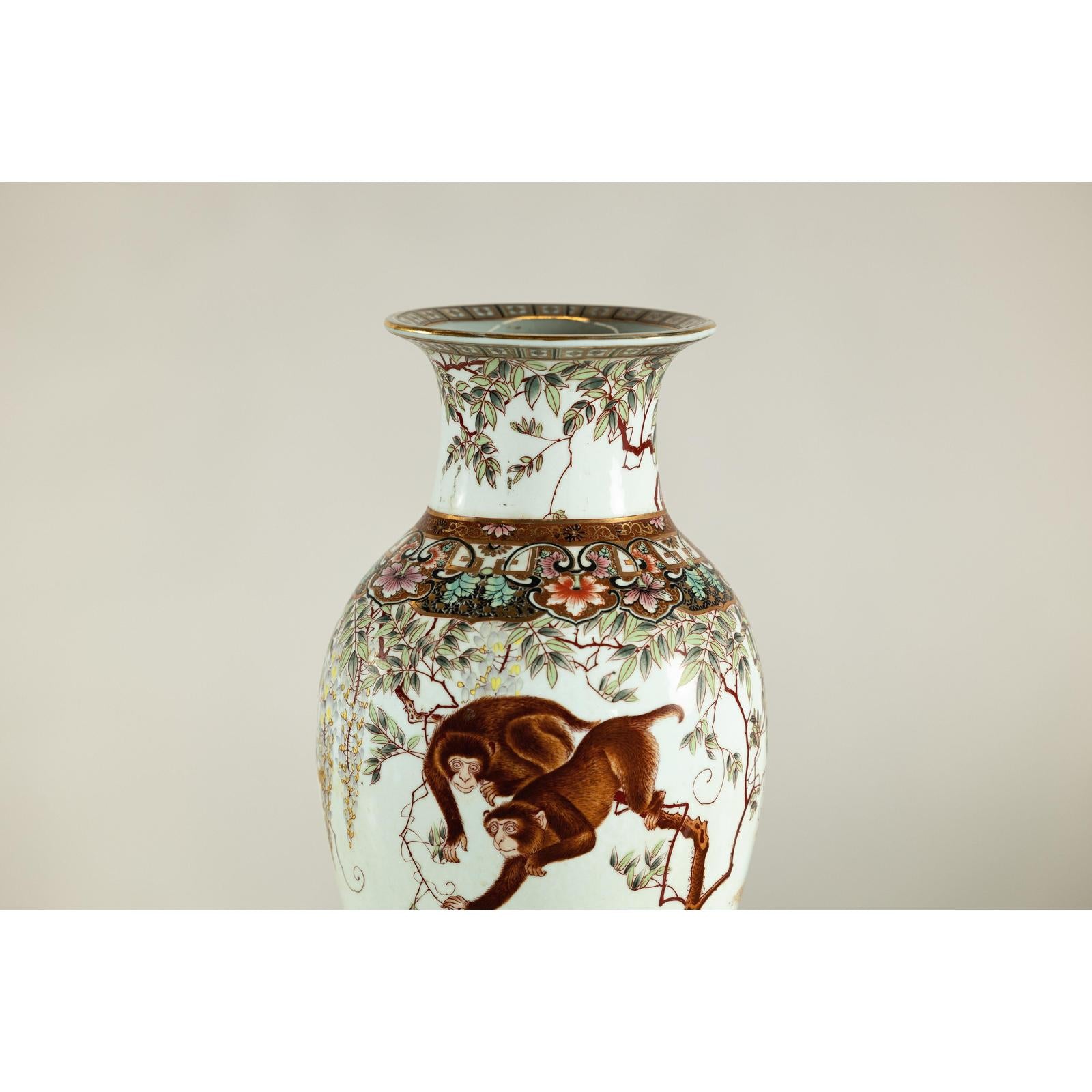 Porcelain Baluster Shaped Vase with Hand-Painted Monkeys and Floral Motifs