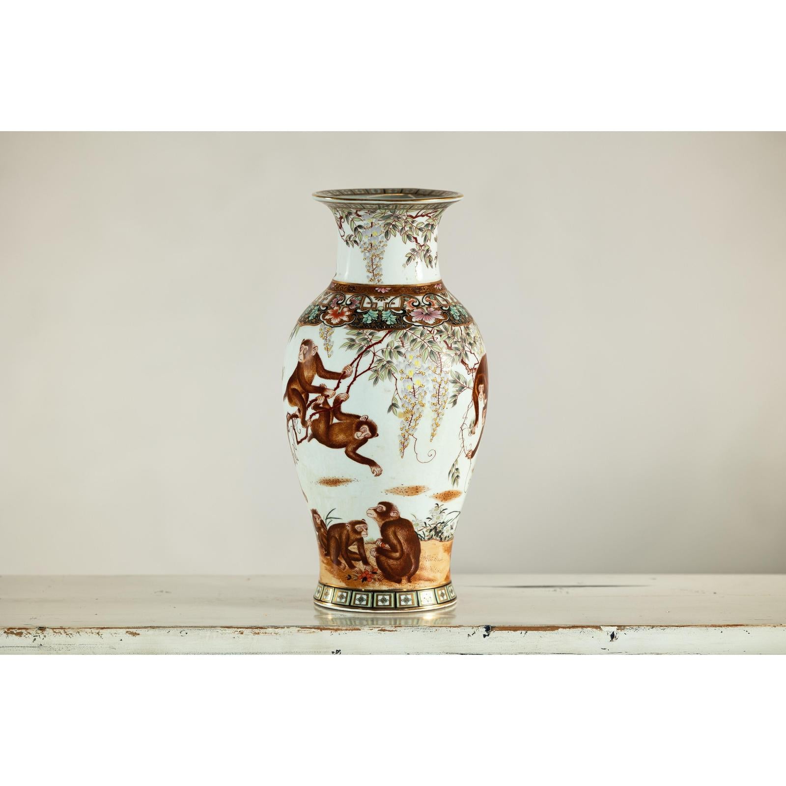 Porcelain Baluster Shaped Vase with Hand-Painted Monkeys and Floral Motifs