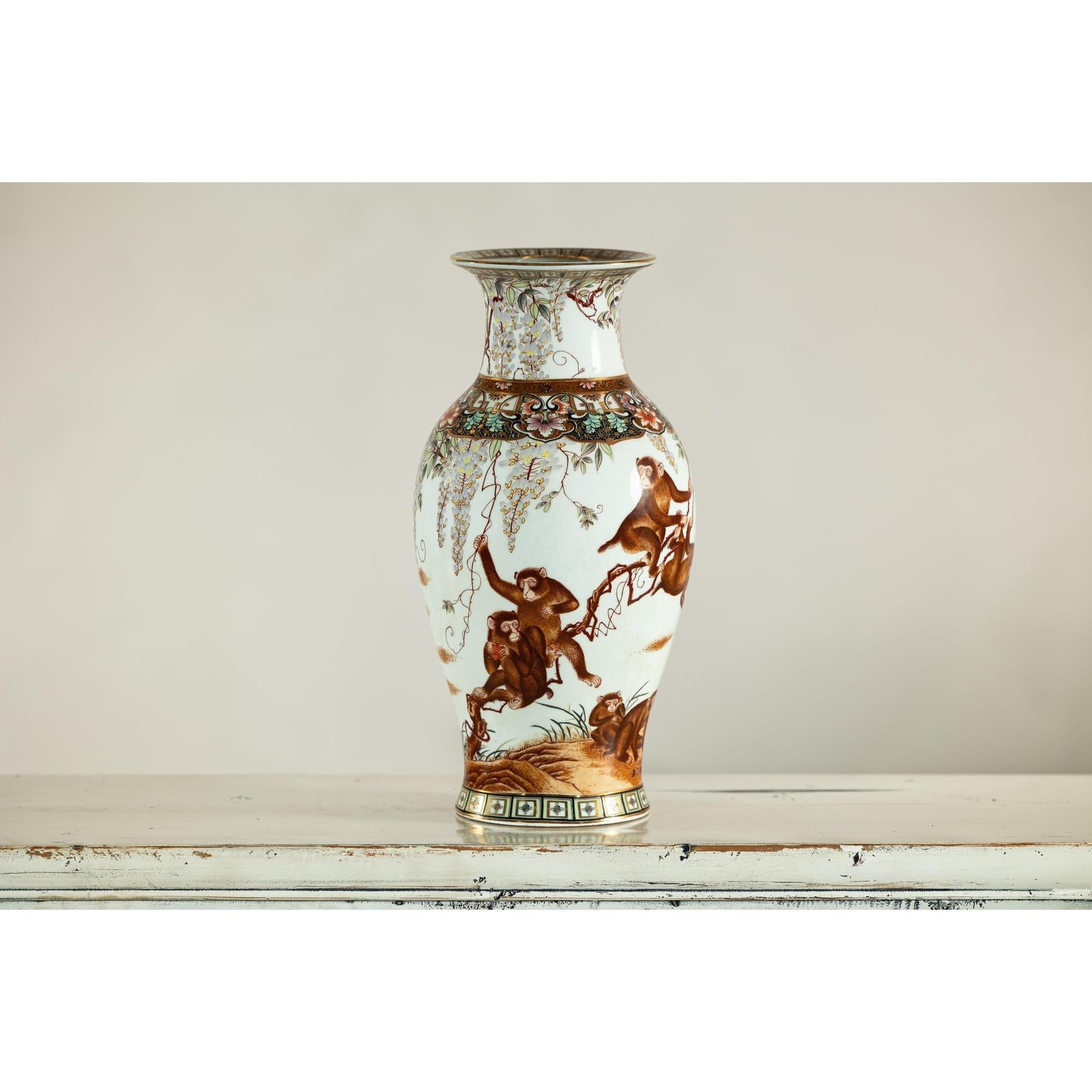 Porcelain Baluster Shaped Vase with Hand-Painted Monkeys and Floral Motifs