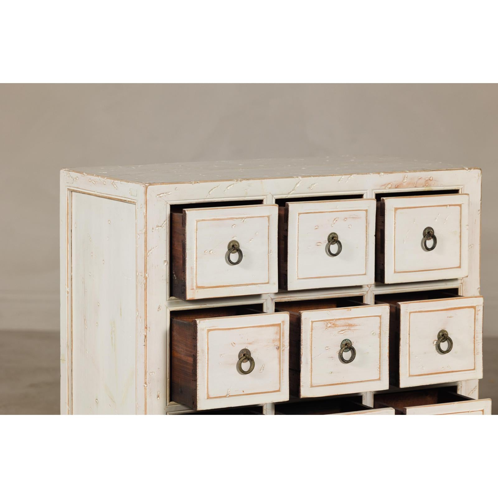 Vintage Distressed White Lacquer Apothecary Chests – Near Pair with Nine Drawers