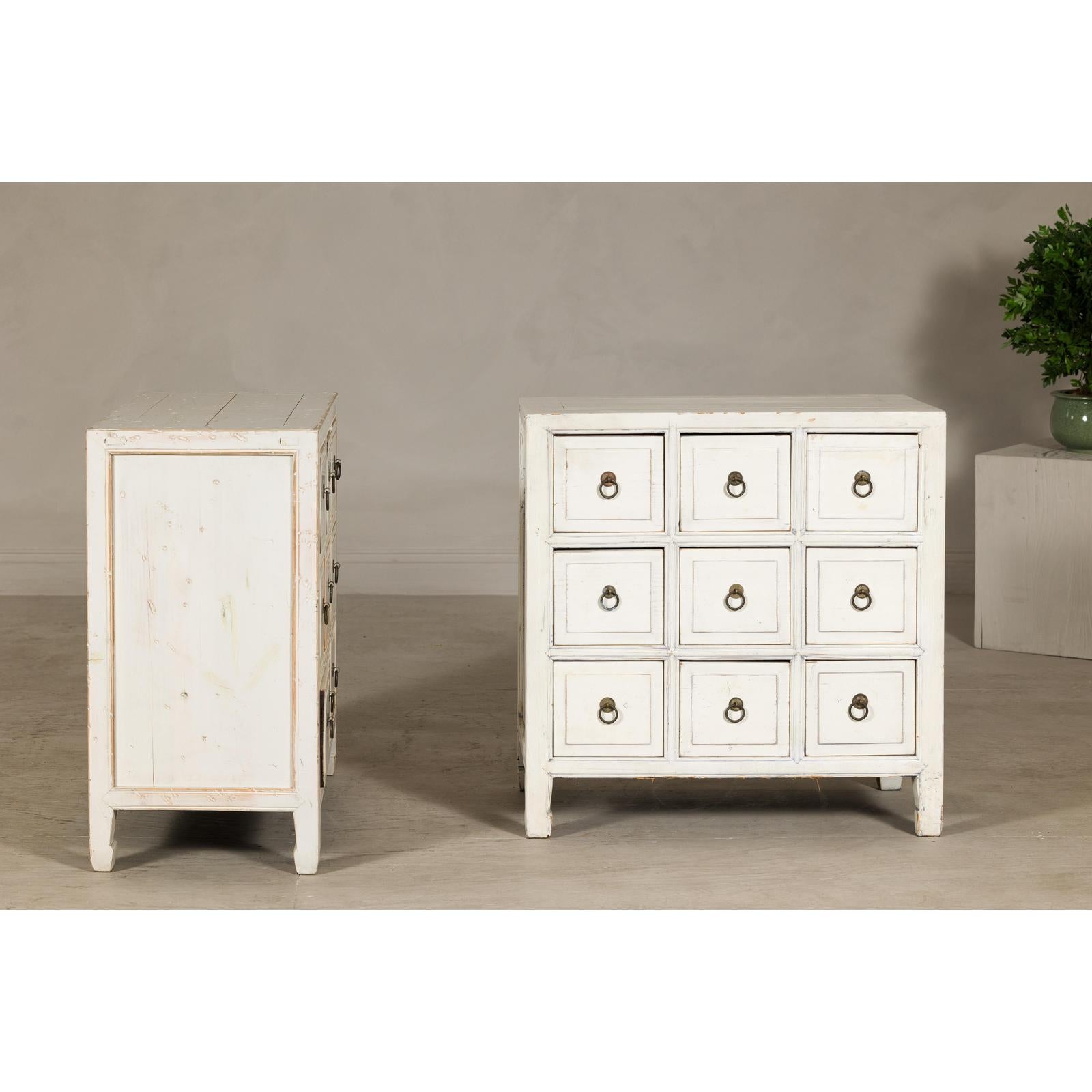 Vintage Distressed White Lacquer Apothecary Chests – Near Pair with Nine Drawers