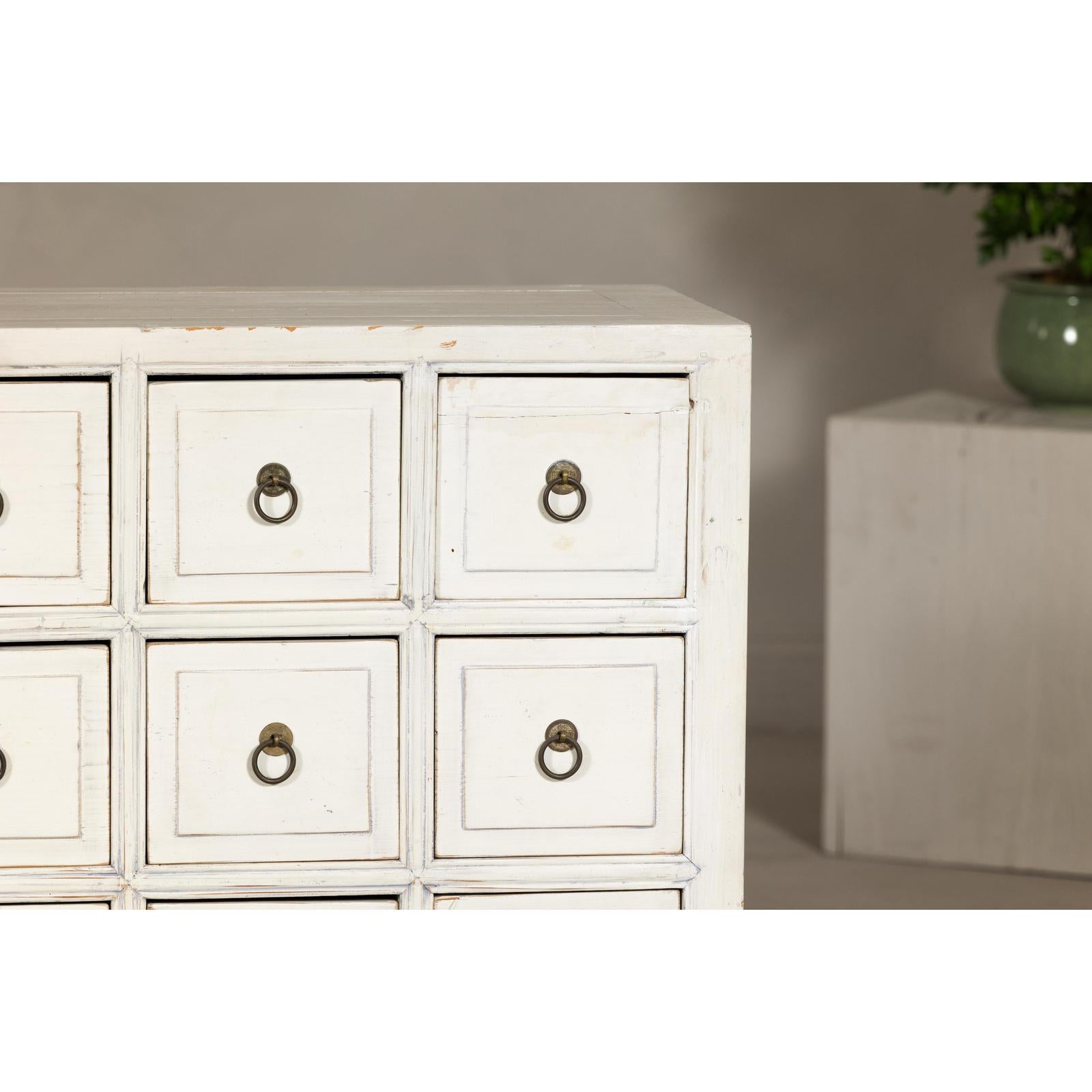 Vintage Distressed White Lacquer Apothecary Chests – Near Pair with Nine Drawers