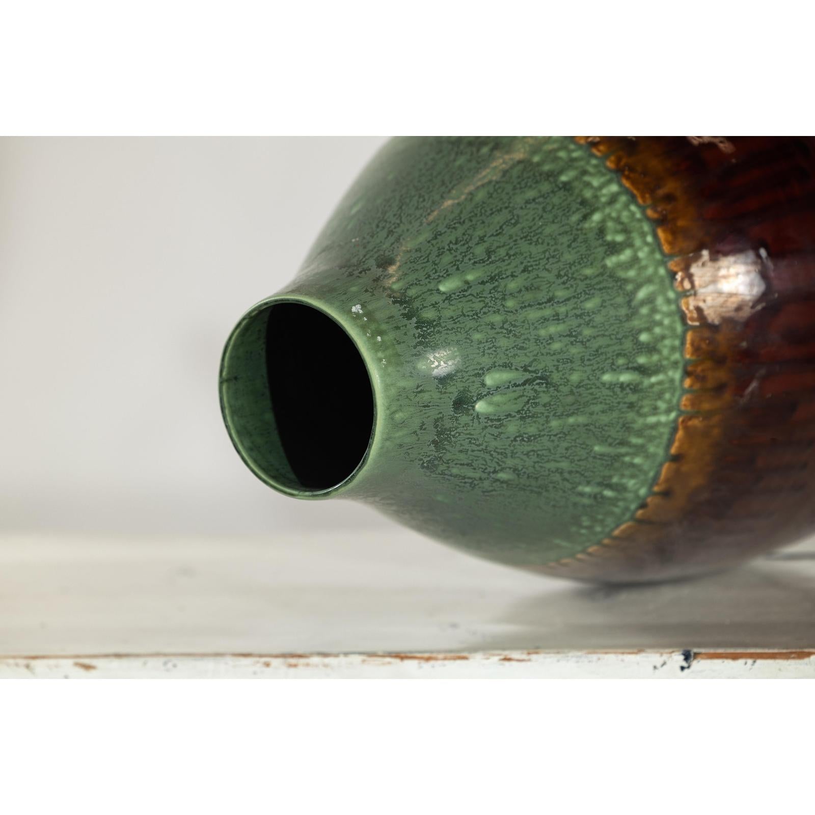 Green and Brown Glazed Ceramic Vase with Drip Effect and Rounded Silhouette