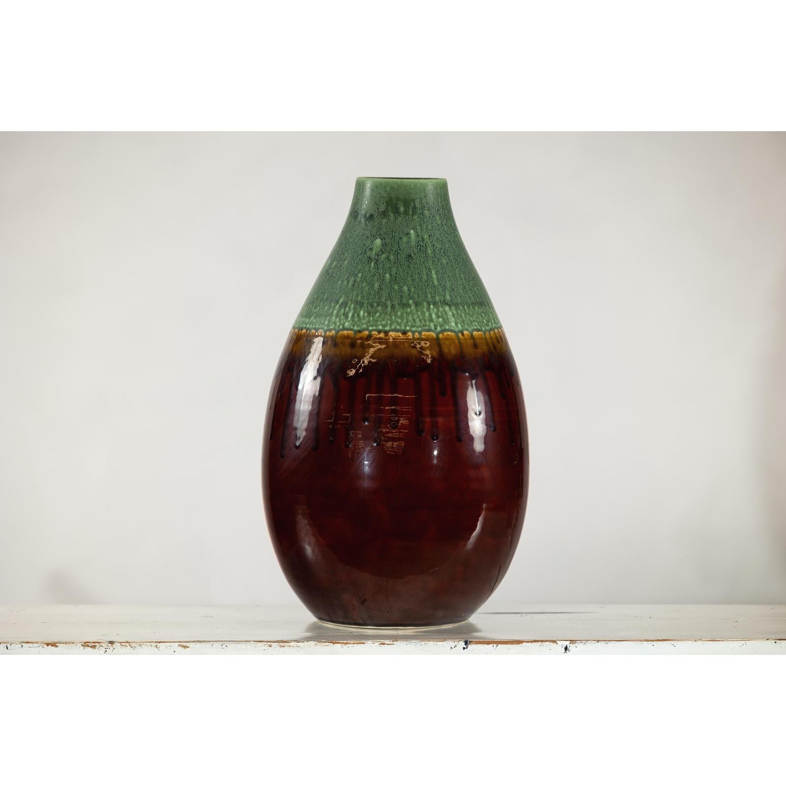 Green and Brown Glazed Ceramic Vase with Drip Effect and Rounded Silhouette