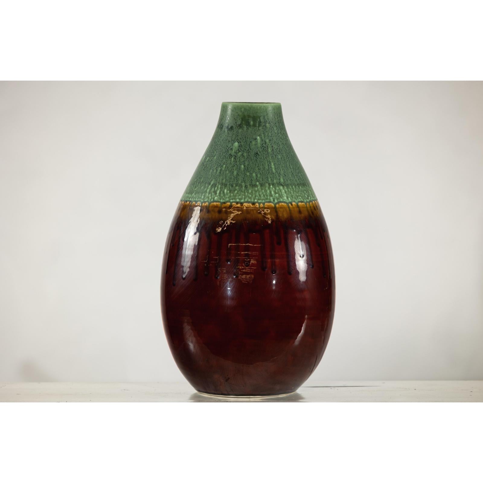 Green and Brown Glazed Ceramic Vase with Drip Effect and Rounded Silhouette