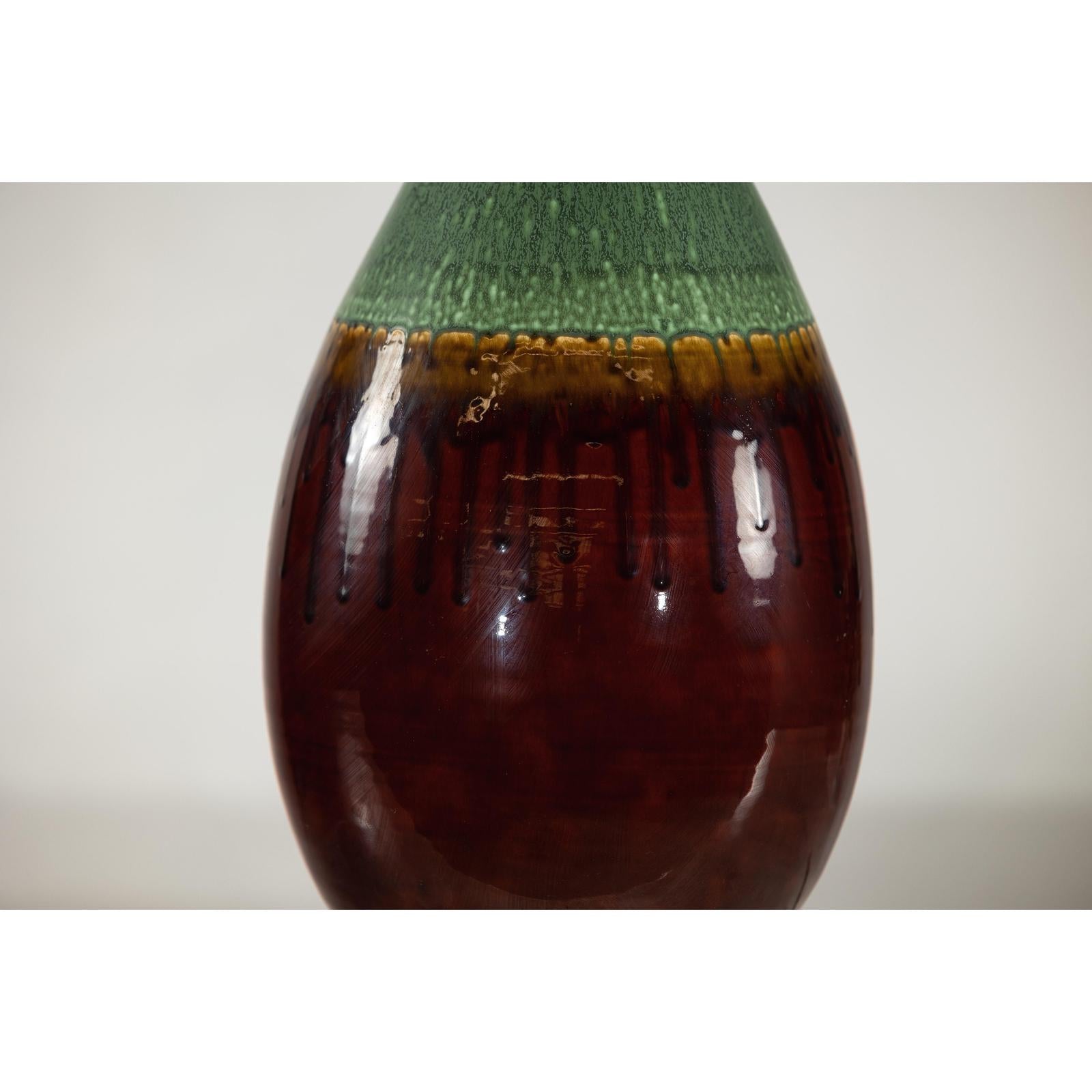 Green and Brown Glazed Ceramic Vase with Drip Effect and Rounded Silhouette