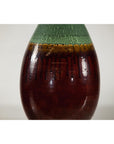 Green and Brown Glazed Ceramic Vase with Drip Effect and Rounded Silhouette
