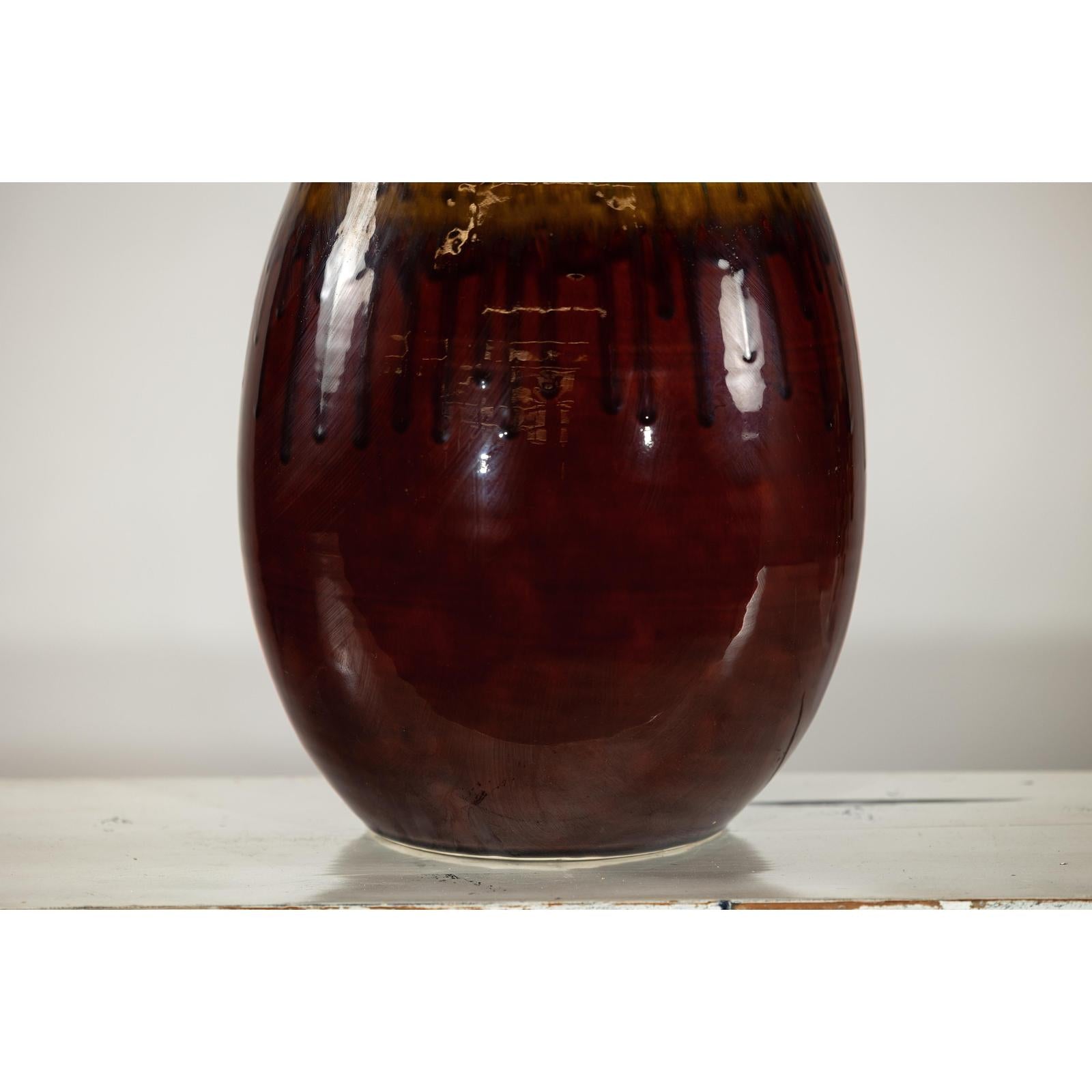 Green and Brown Glazed Ceramic Vase with Drip Effect and Rounded Silhouette