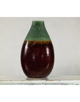 Green and Brown Glazed Ceramic Vase with Drip Effect and Rounded Silhouette