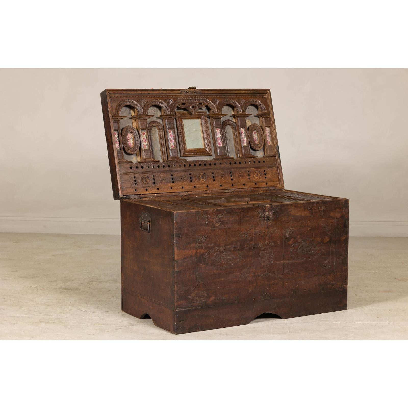 Antique Wedding Trunk with Carved Details, Mirror, and Hidden Storage