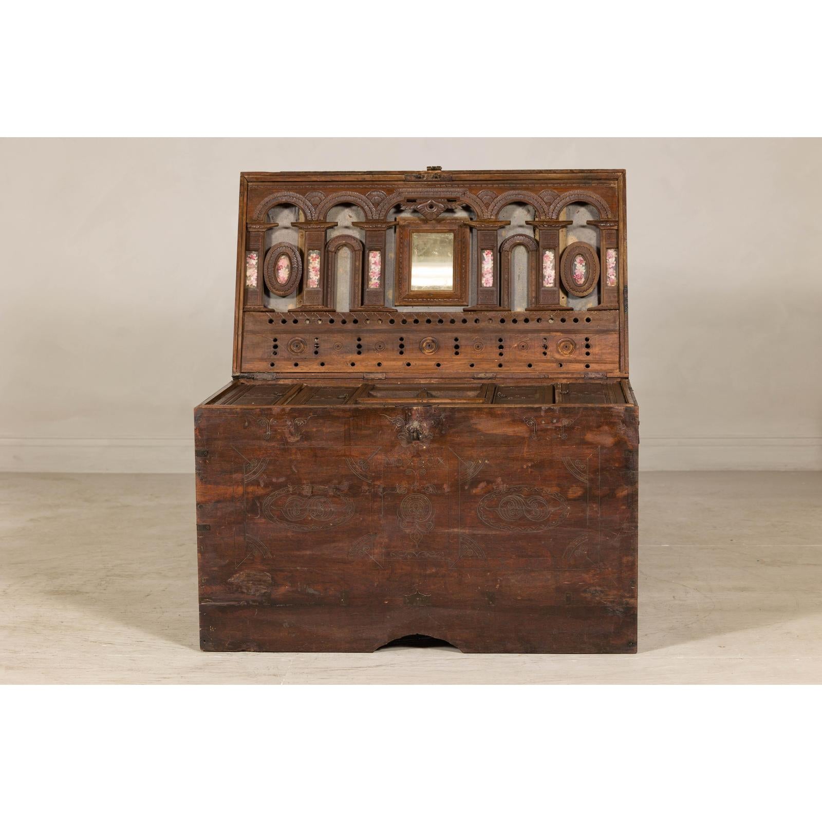 Antique Wedding Trunk with Carved Details, Mirror, and Hidden Storage