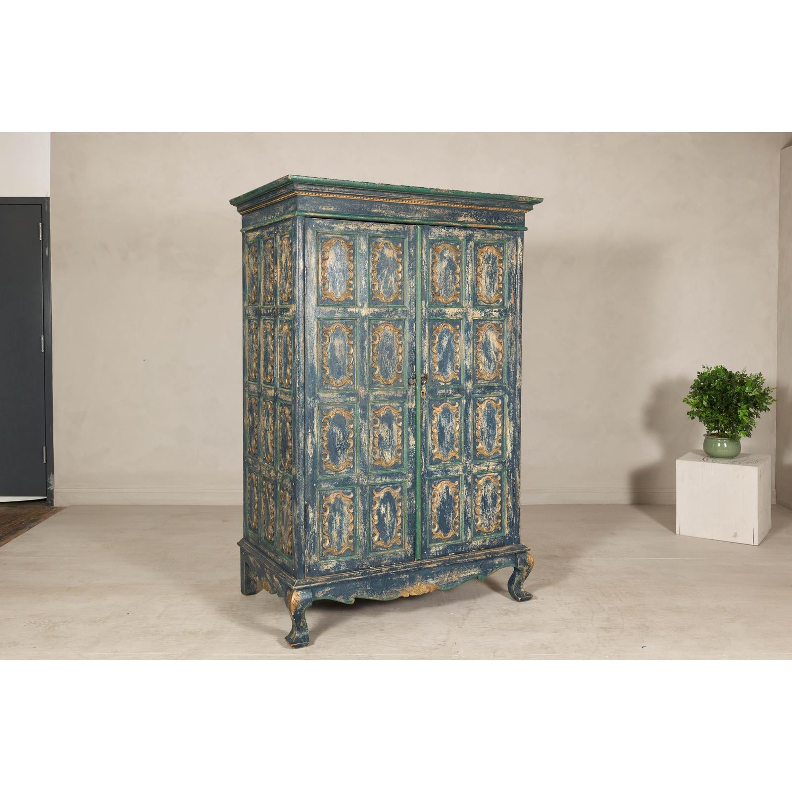 Cabinet in Blue Patina with Carved Doors and Cabriole Legs