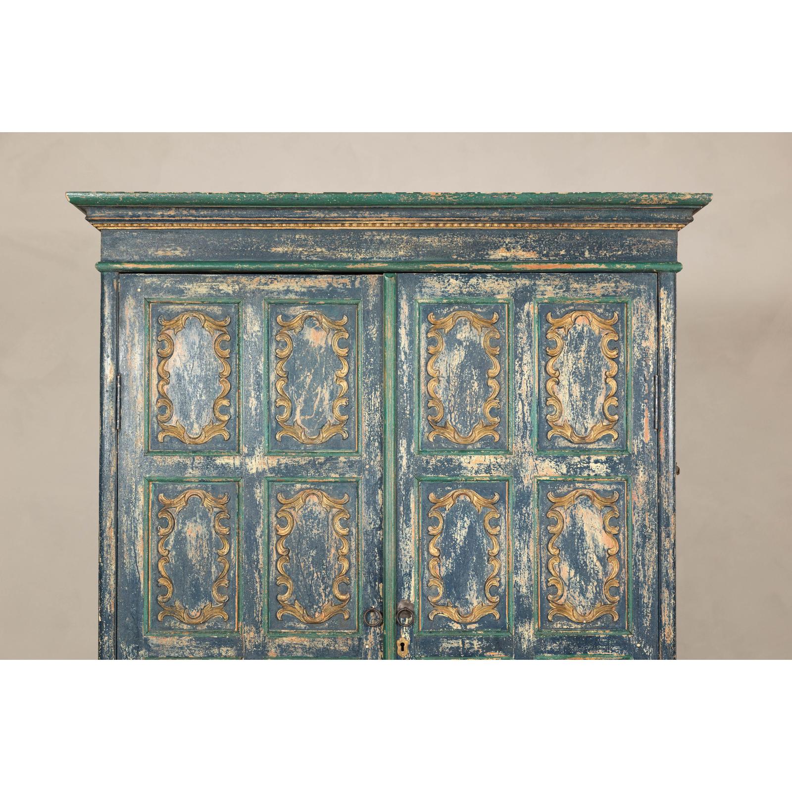 Cabinet in Blue Patina with Carved Doors and Cabriole Legs