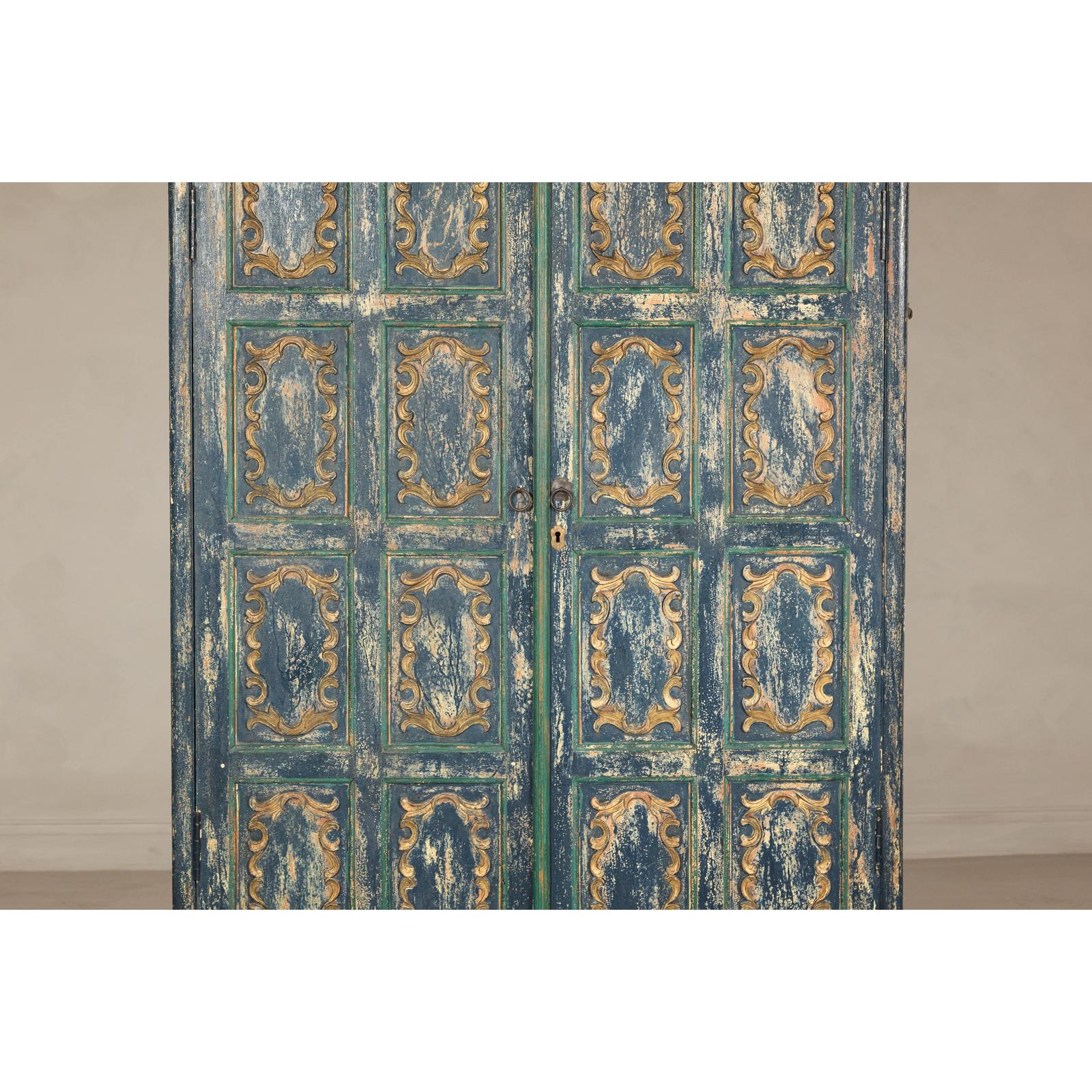 Cabinet in Blue Patina with Carved Doors and Cabriole Legs