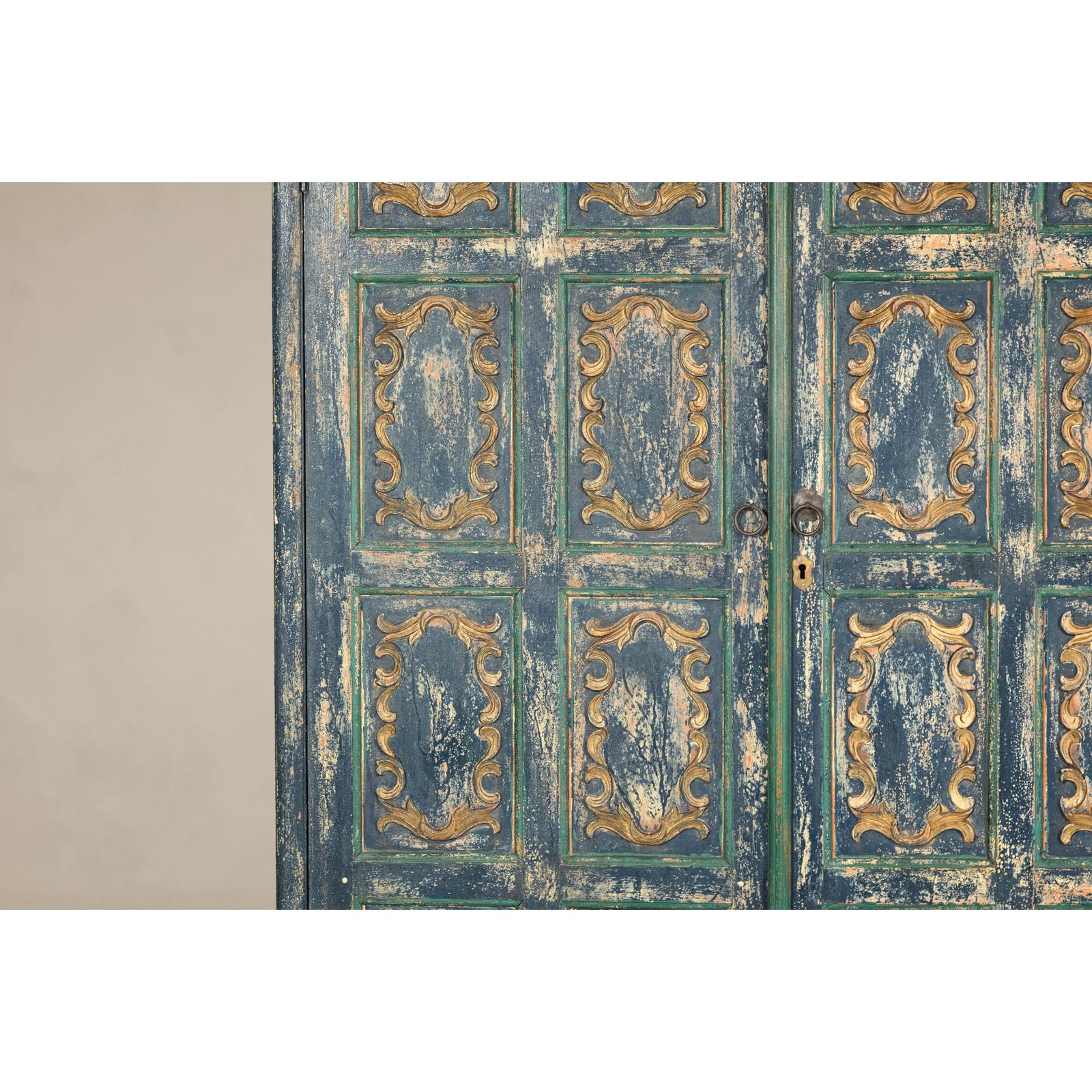 Cabinet in Blue Patina with Carved Doors and Cabriole Legs