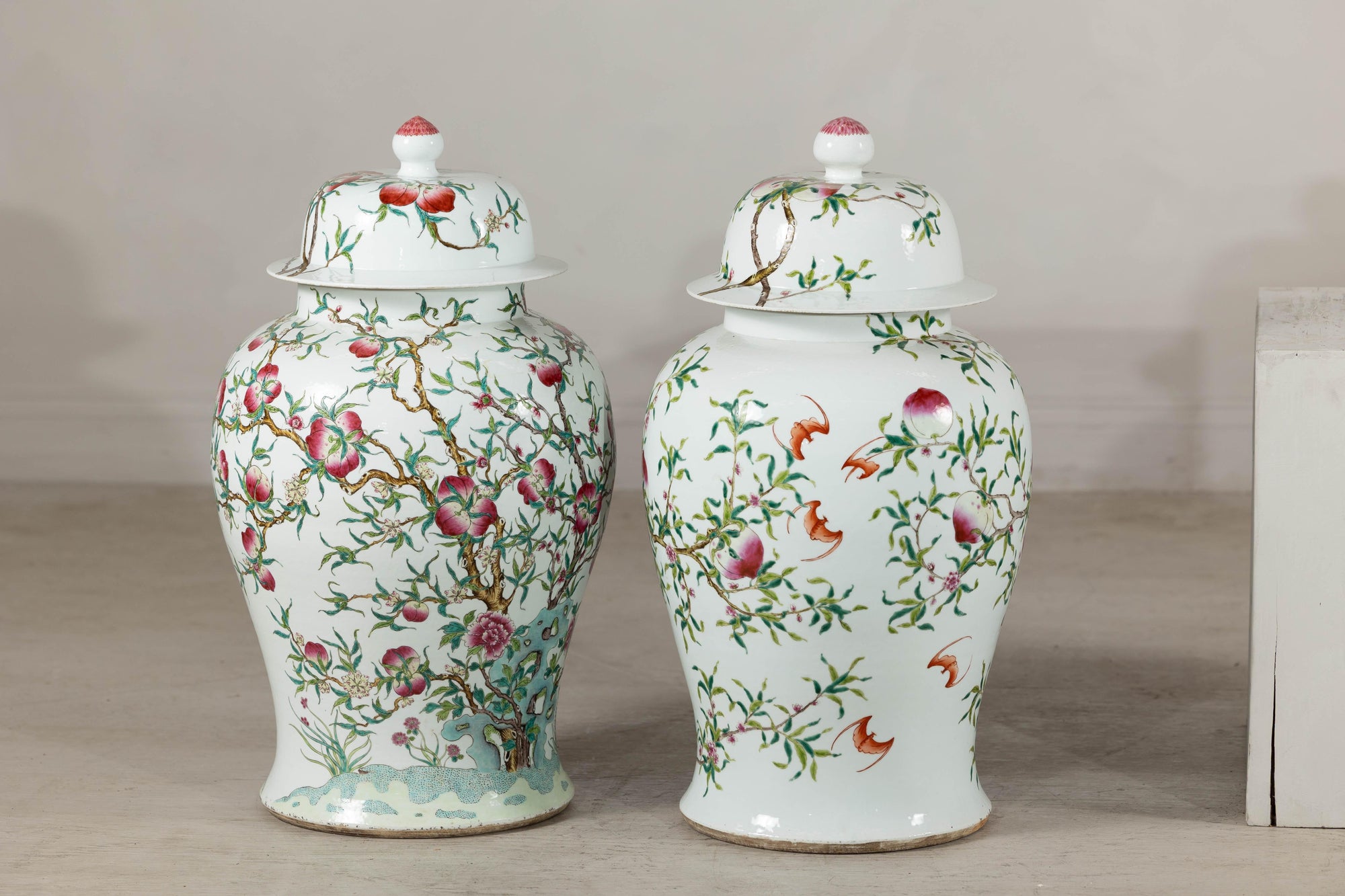 Near Pair of Famille Rose Ginger Jars with Peaches, Roses and Bats