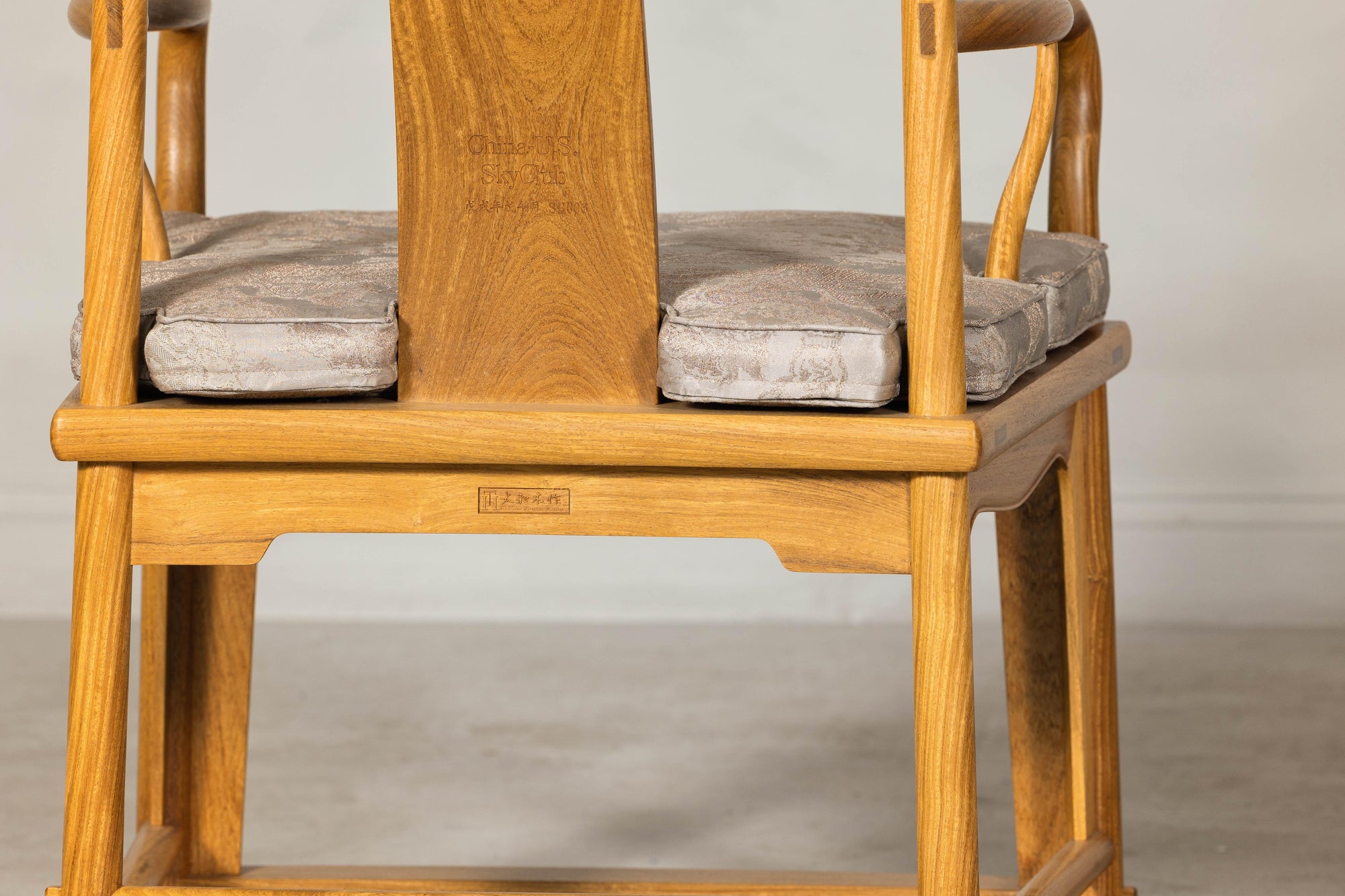 Pair of Ming-Style Hardwood Armchairs with Carved Medallion and Cushions