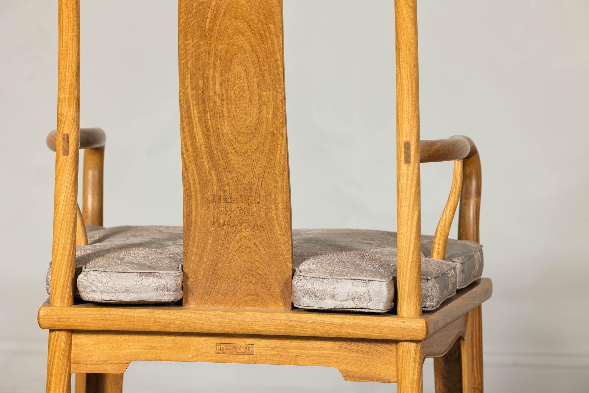 Pair of Ming-Style Hardwood Armchairs with Carved Medallion and Cushions