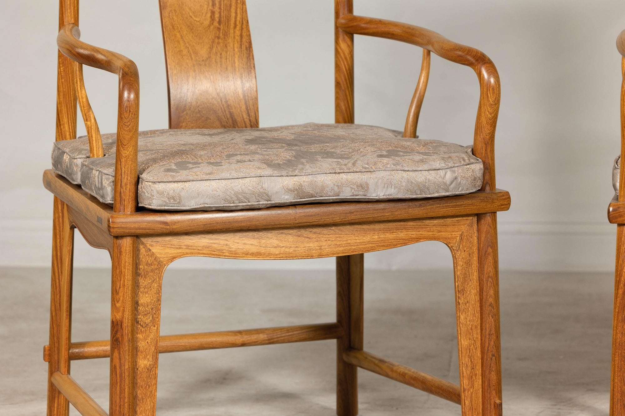 Pair of Ming-Style Hardwood Armchairs with Carved Medallion and Cushions