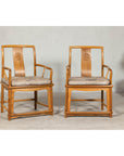 Pair of Ming-Style Hardwood Armchairs with Carved Medallion and Cushions