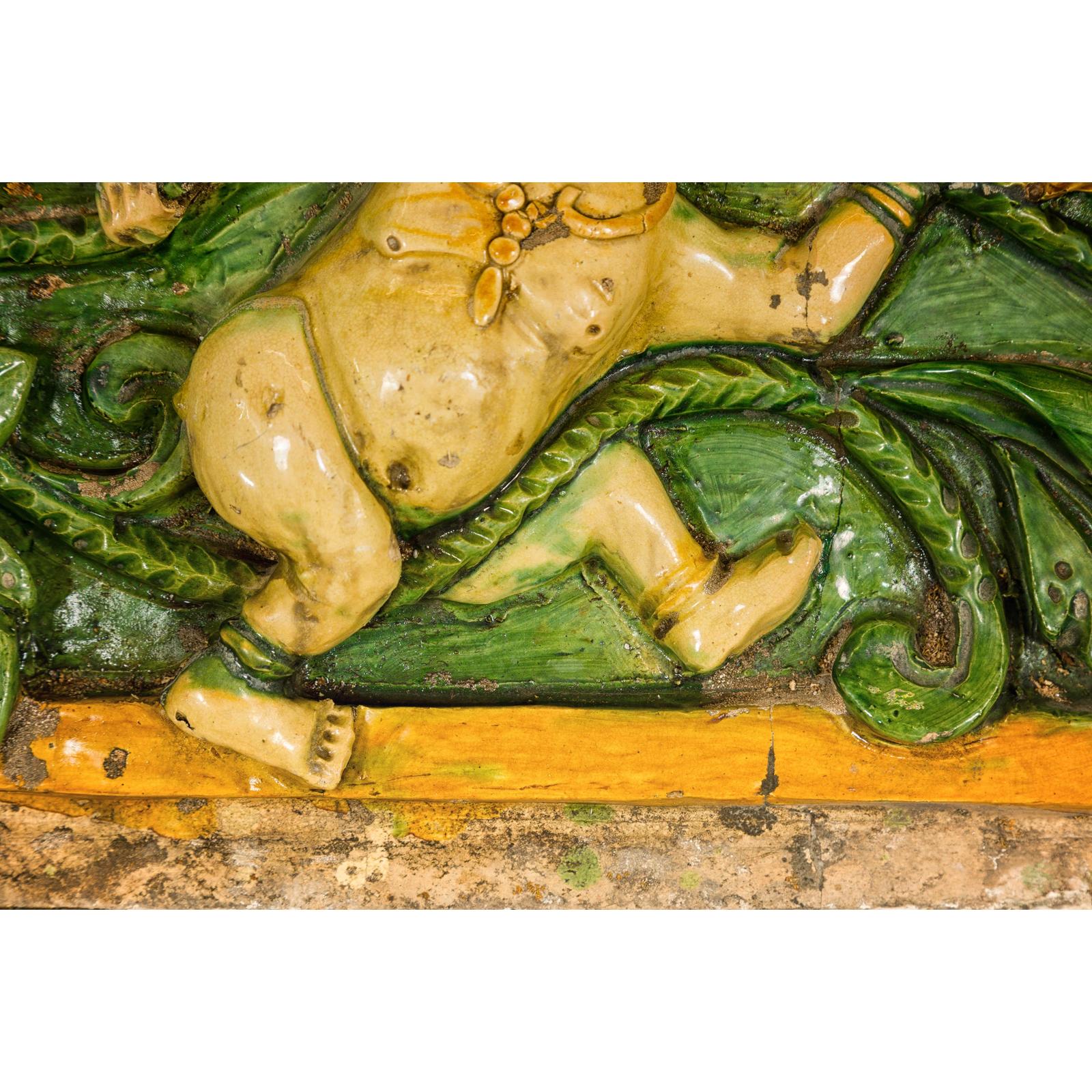 Qing Dynasty Tricolor Raised Relief Roof Fragment from Temple with Boy in Leaves