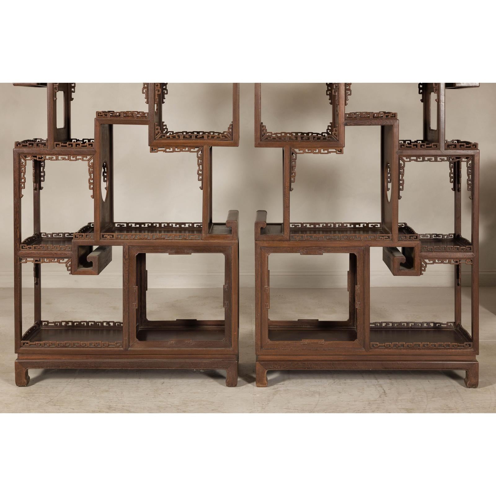 Pair of Late Qing Dynasty Brown Lacquered Display Shelves with Fretwork Motifs