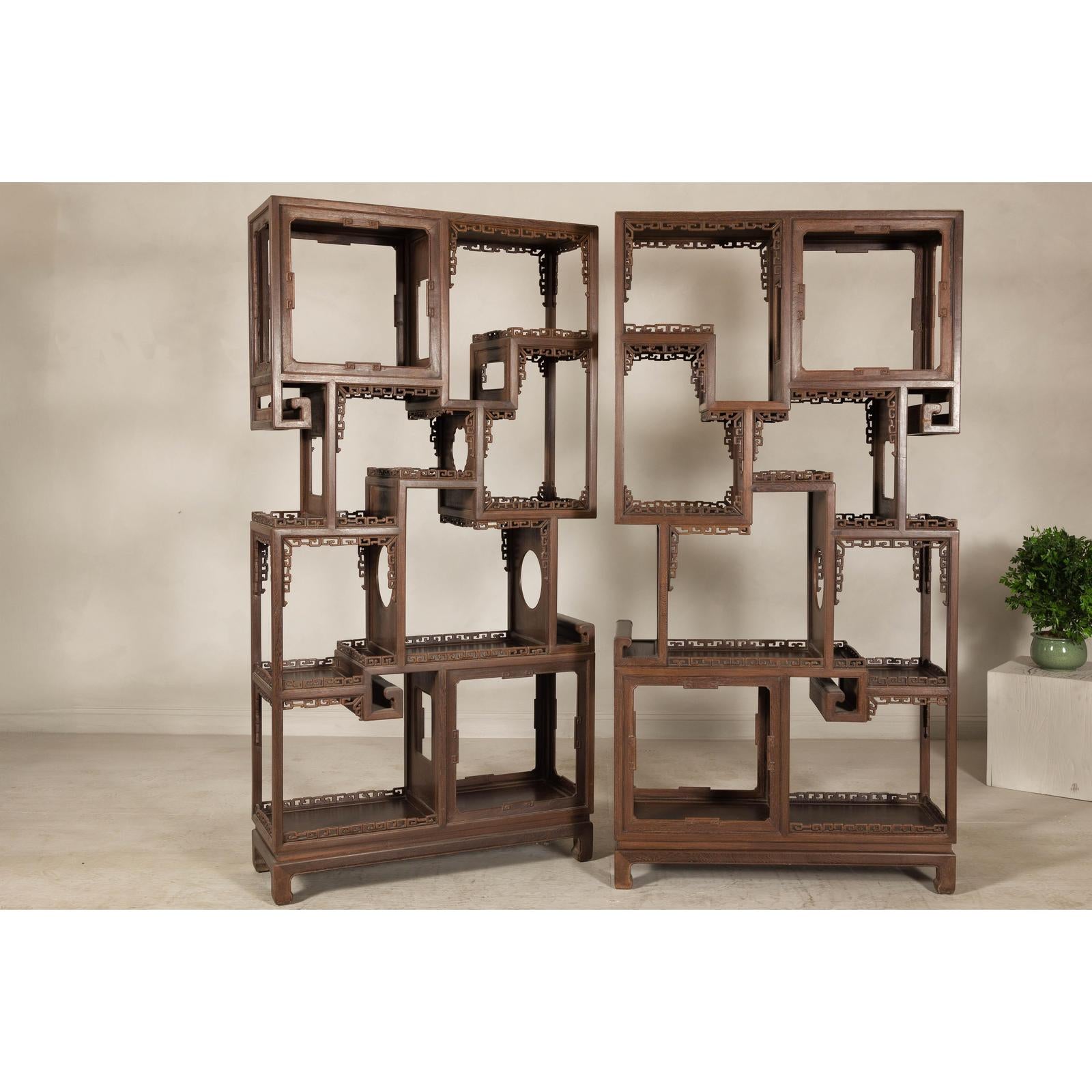 Pair of Late Qing Dynasty Brown Lacquered Display Shelves with Fretwork Motifs