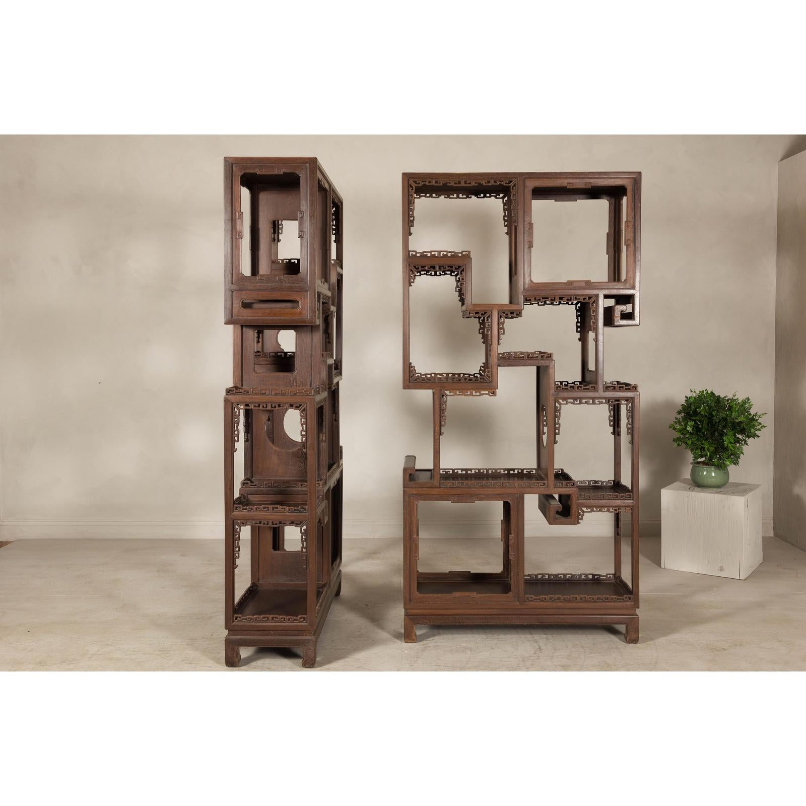 Pair of Late Qing Dynasty Brown Lacquered Display Shelves with Fretwork Motifs