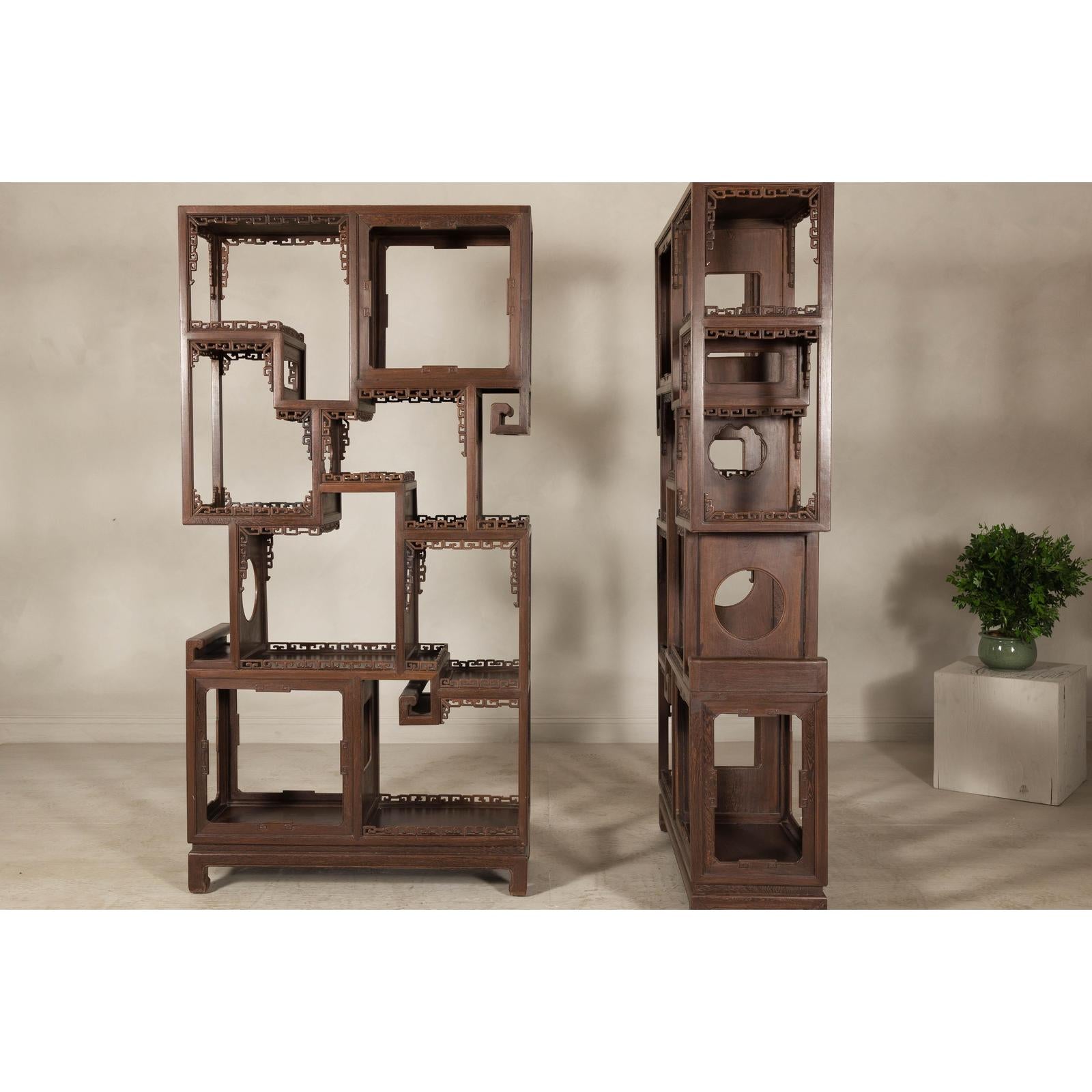 Pair of Late Qing Dynasty Brown Lacquered Display Shelves with Fretwork Motifs