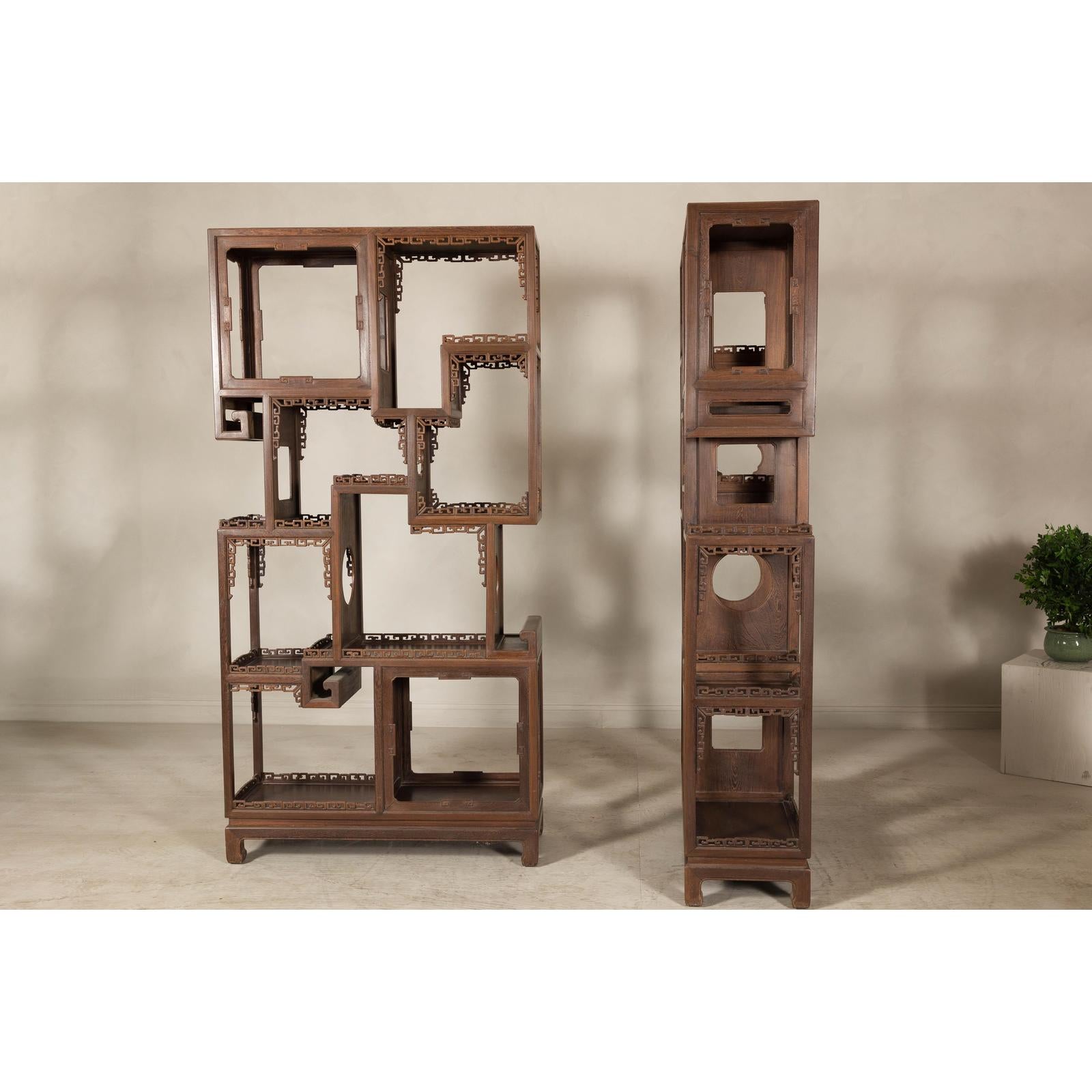 Pair of Late Qing Dynasty Brown Lacquered Display Shelves with Fretwork Motifs