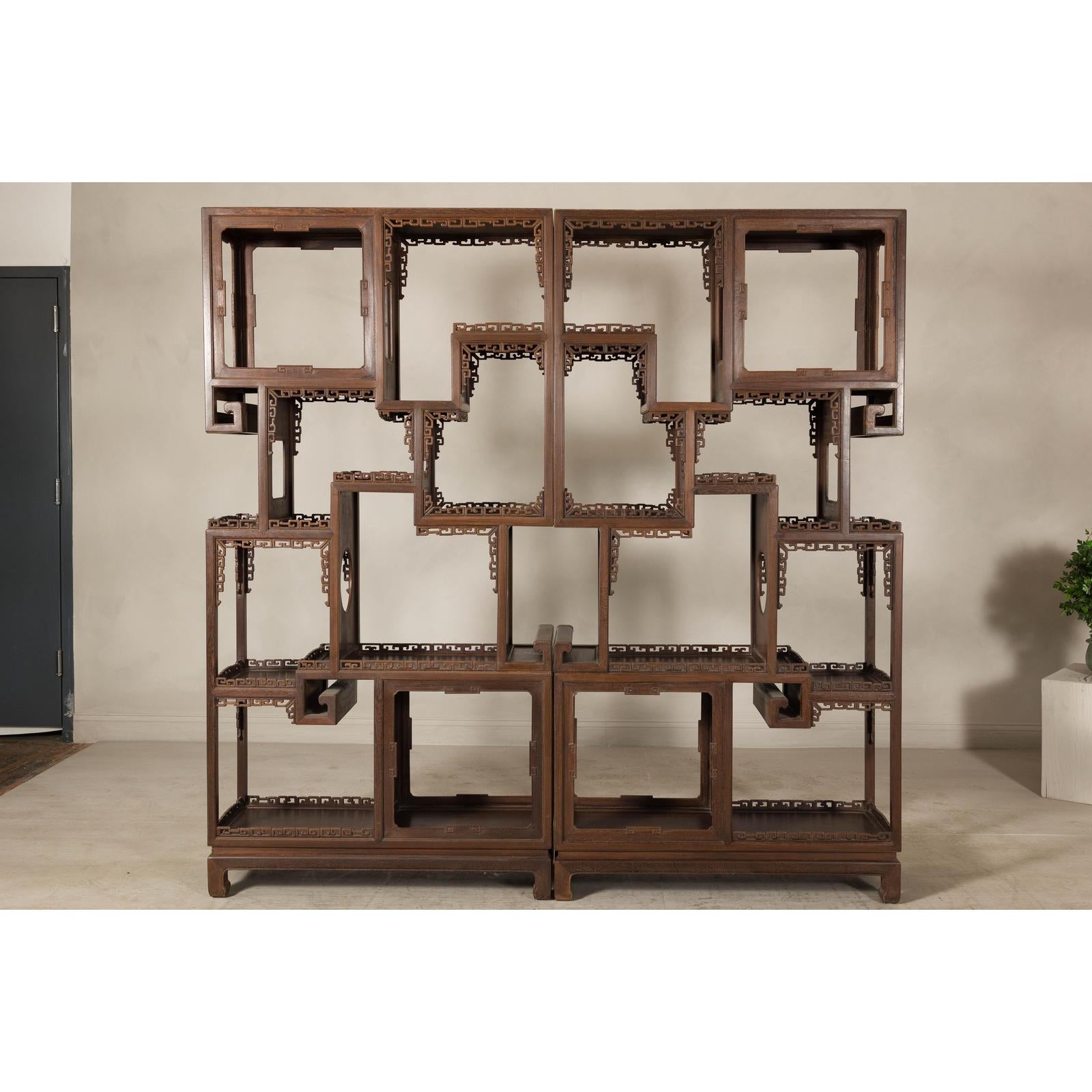 Pair of Late Qing Dynasty Brown Lacquered Display Shelves with Fretwork Motifs