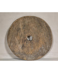 Large Ancient Cart Wheel with Rustic Character and Time-Worn Appearance