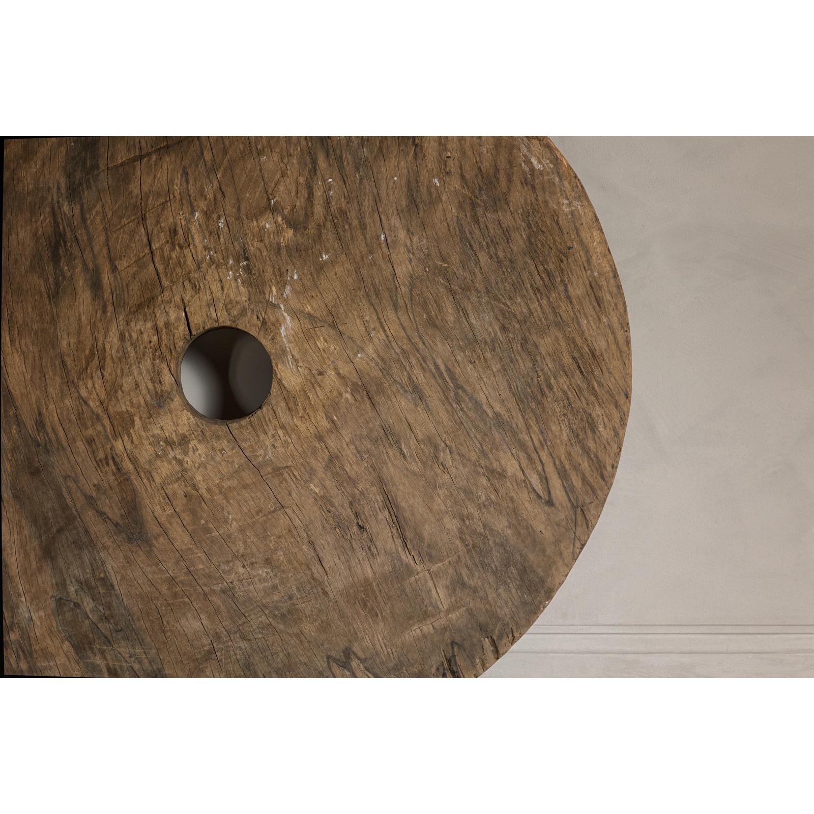 Large Ancient Cart Wheel with Rustic Character and Time-Worn Appearance