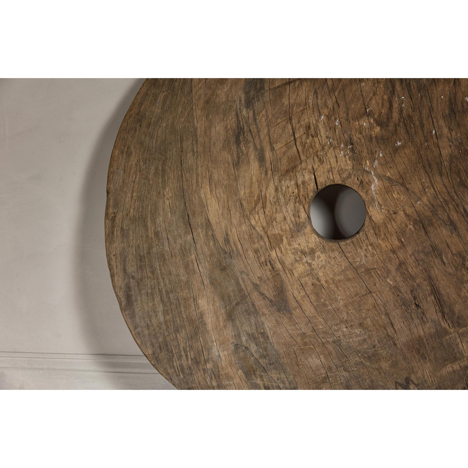 Large Ancient Cart Wheel with Rustic Character and Time-Worn Appearance