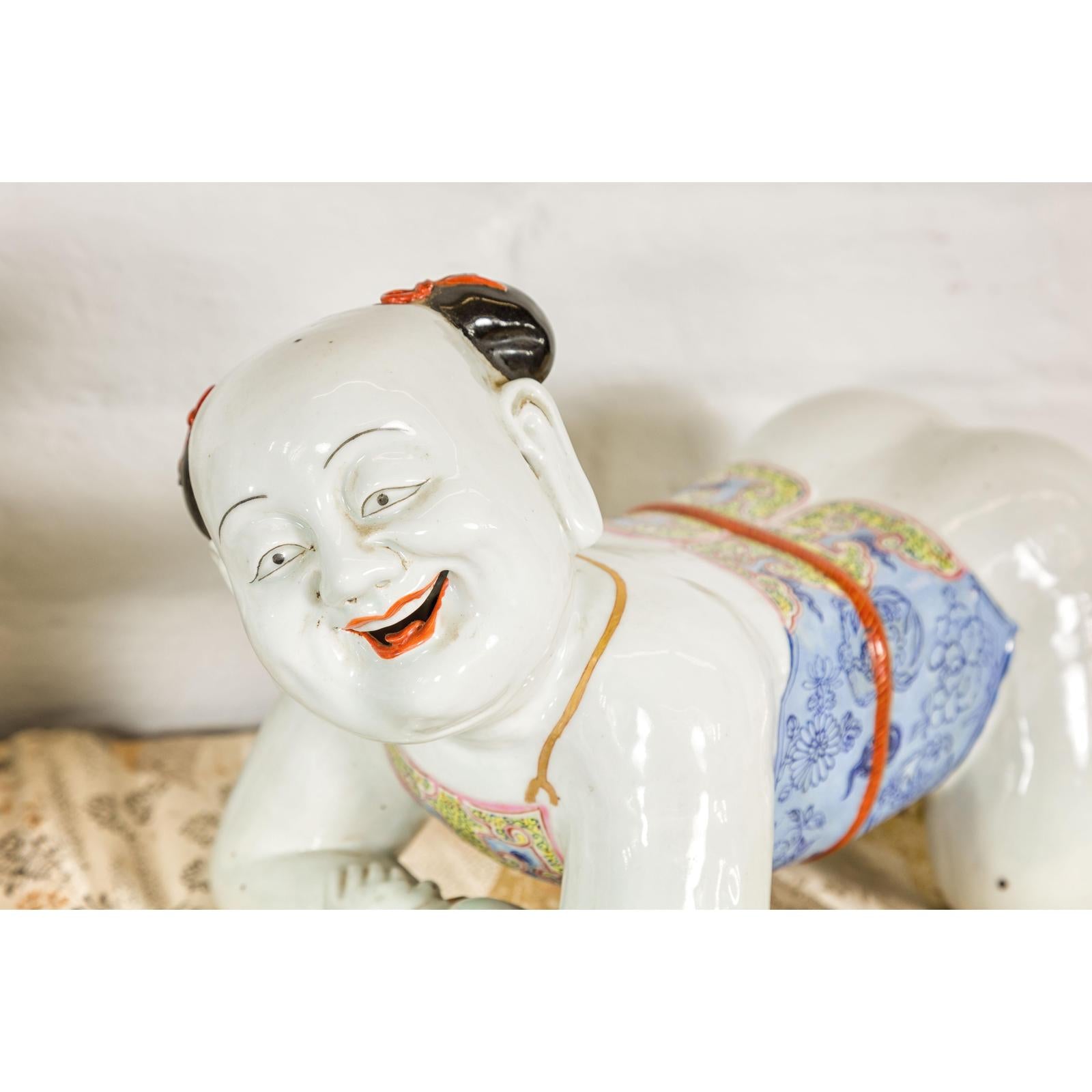 Pair of Qing Dynasty Period Porcelain Tong'zi Figures