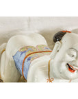 Pair of Qing Dynasty Period Porcelain Tong'zi Figures