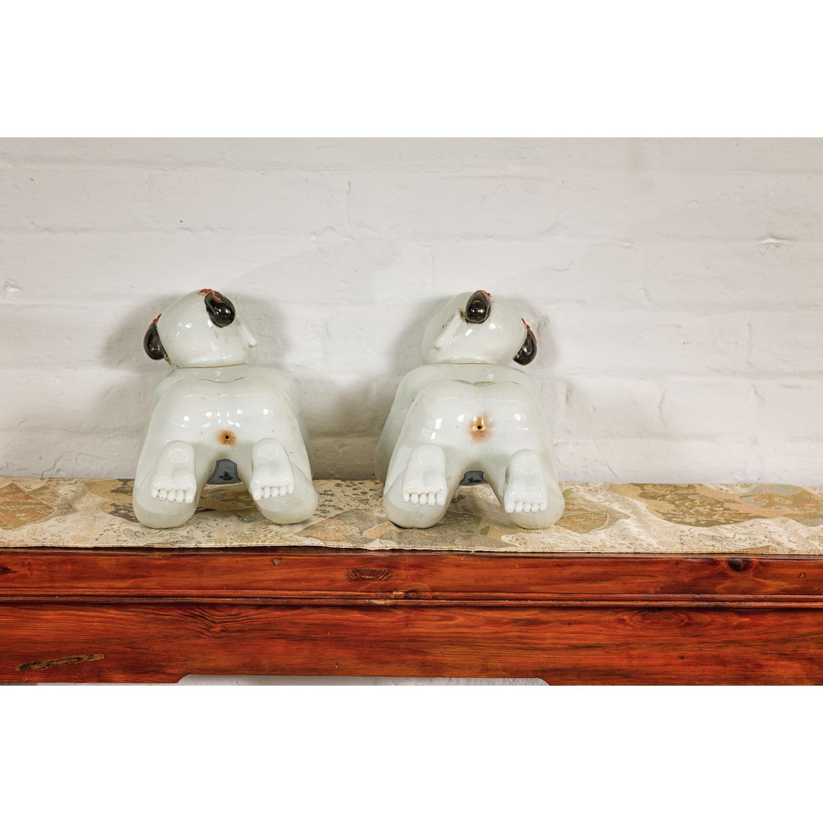 Pair of Qing Dynasty Period Porcelain Tong'zi Figures