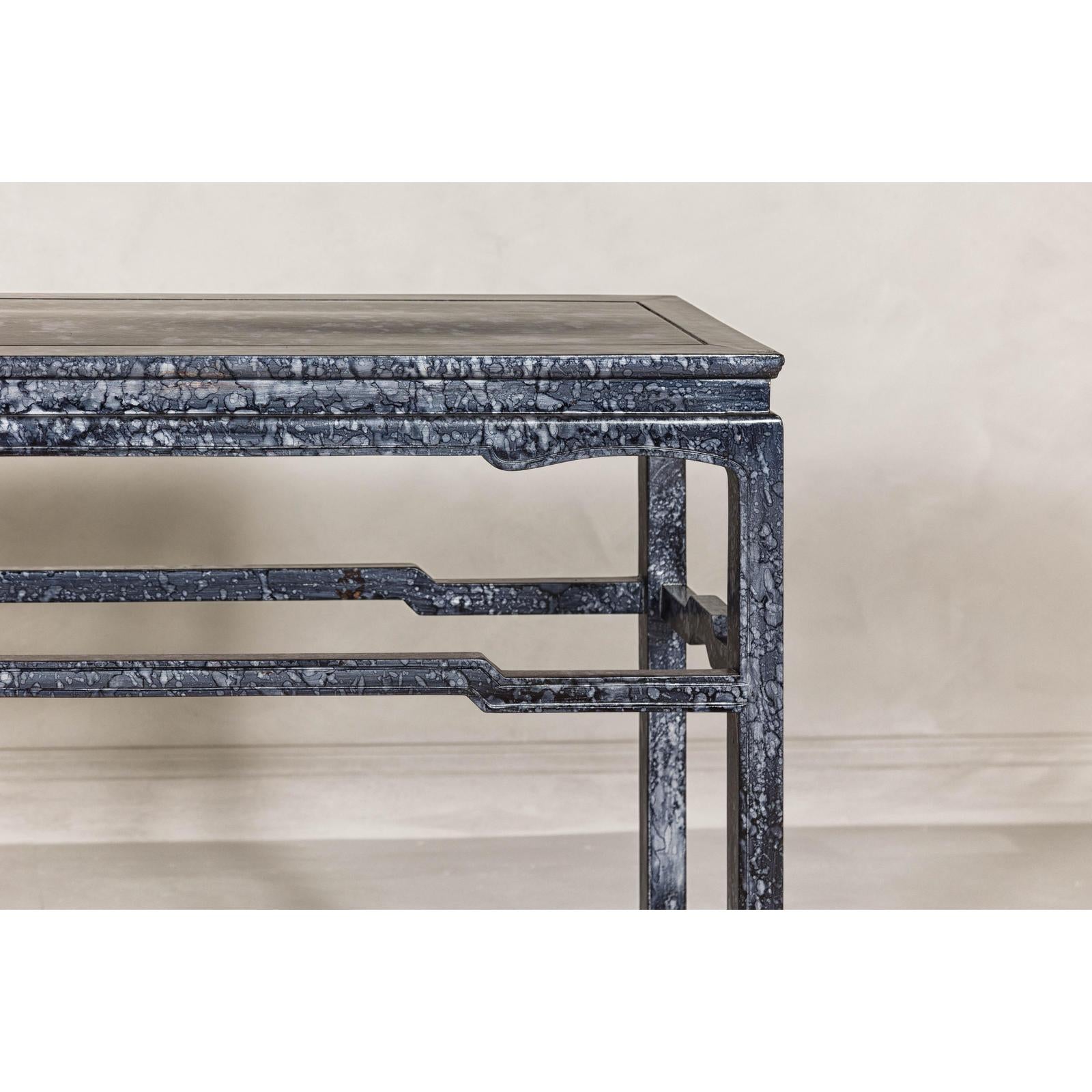 Marbleized Console Table with Silver and Black Finish and Humpback Stretcher