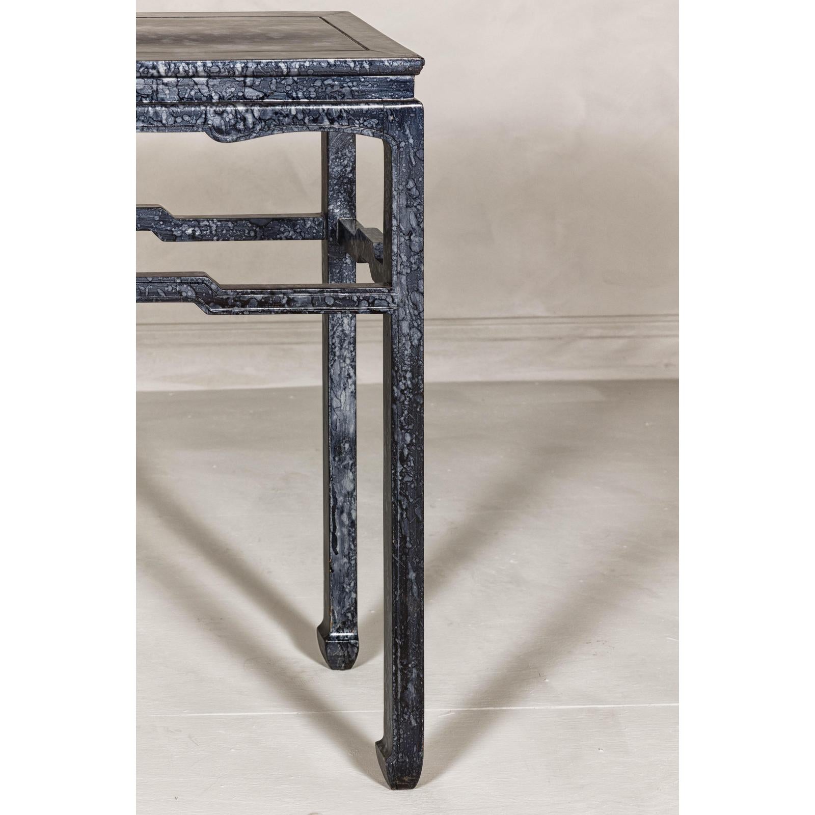 Marbleized Console Table with Silver and Black Finish and Humpback Stretcher