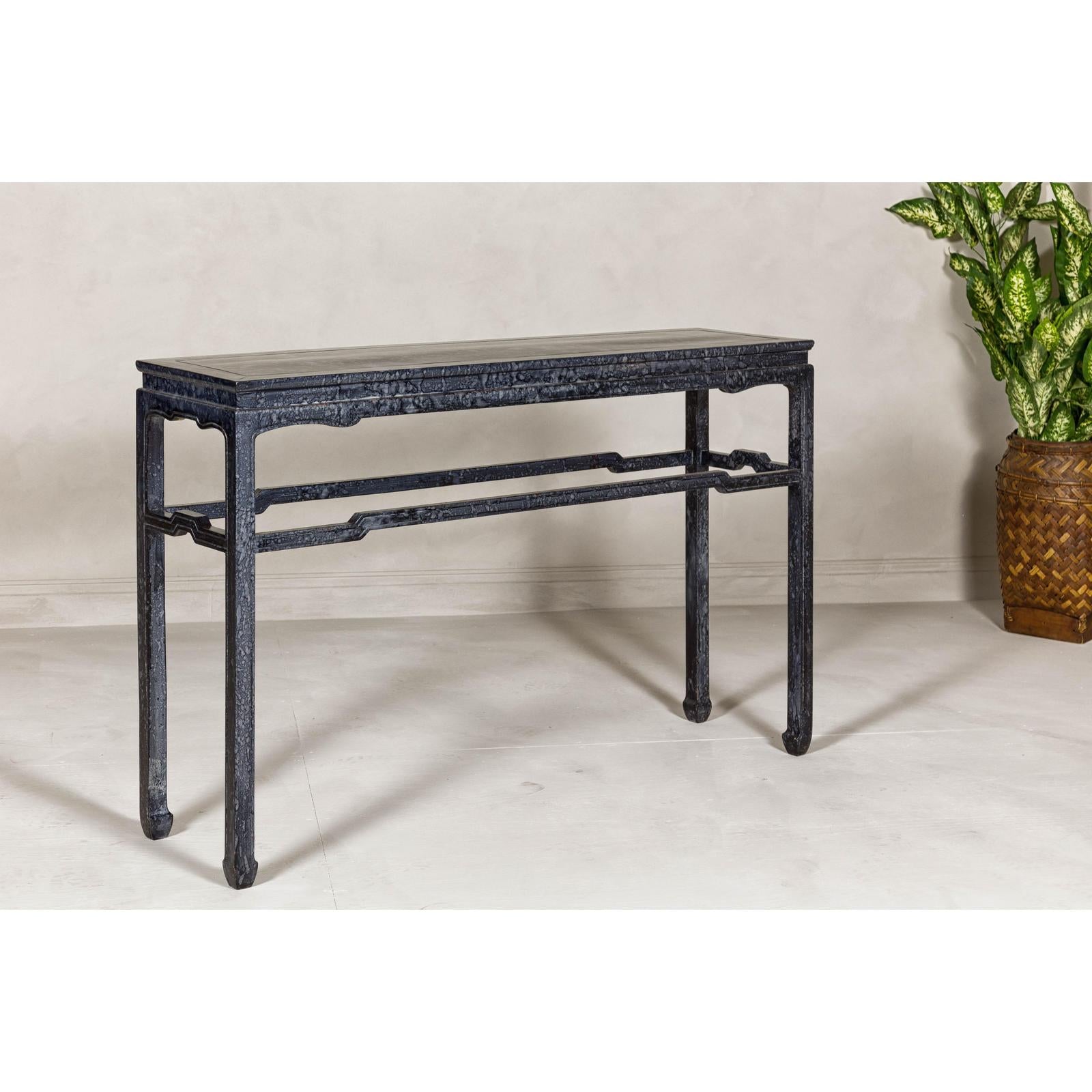 Marbleized Console Table with Silver and Black Finish and Humpback Stretcher
