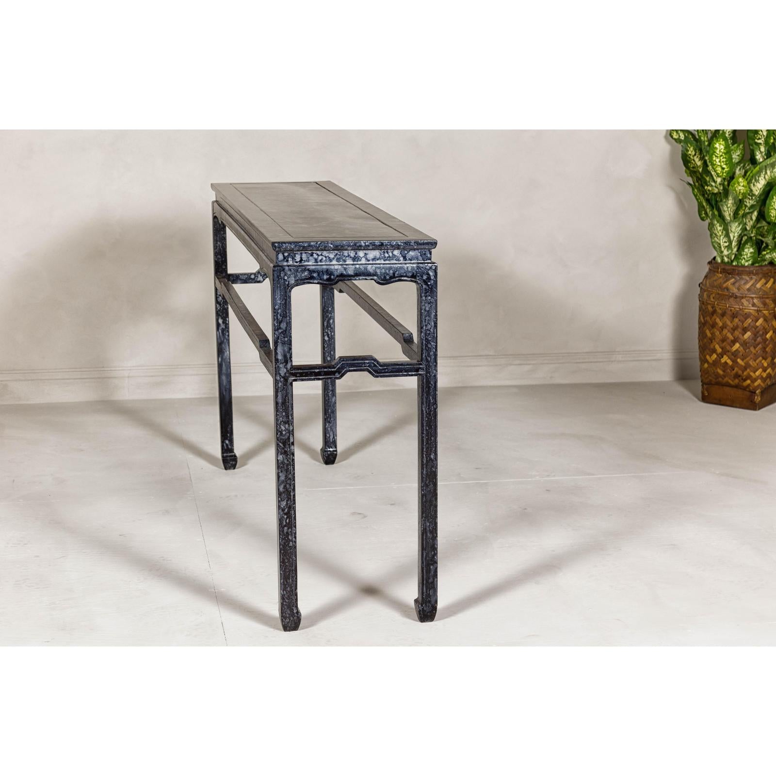 Marbleized Console Table with Silver and Black Finish and Humpback Stretcher